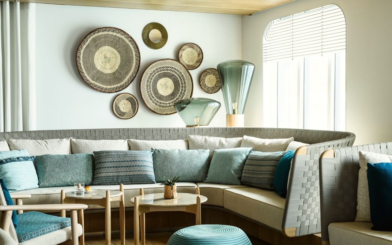 Ponant Explorers, luxury cruise ship designed by the interior design studio jean-philippe nuel, Le Champlain_salon lounge, sofa, ethnic decoration